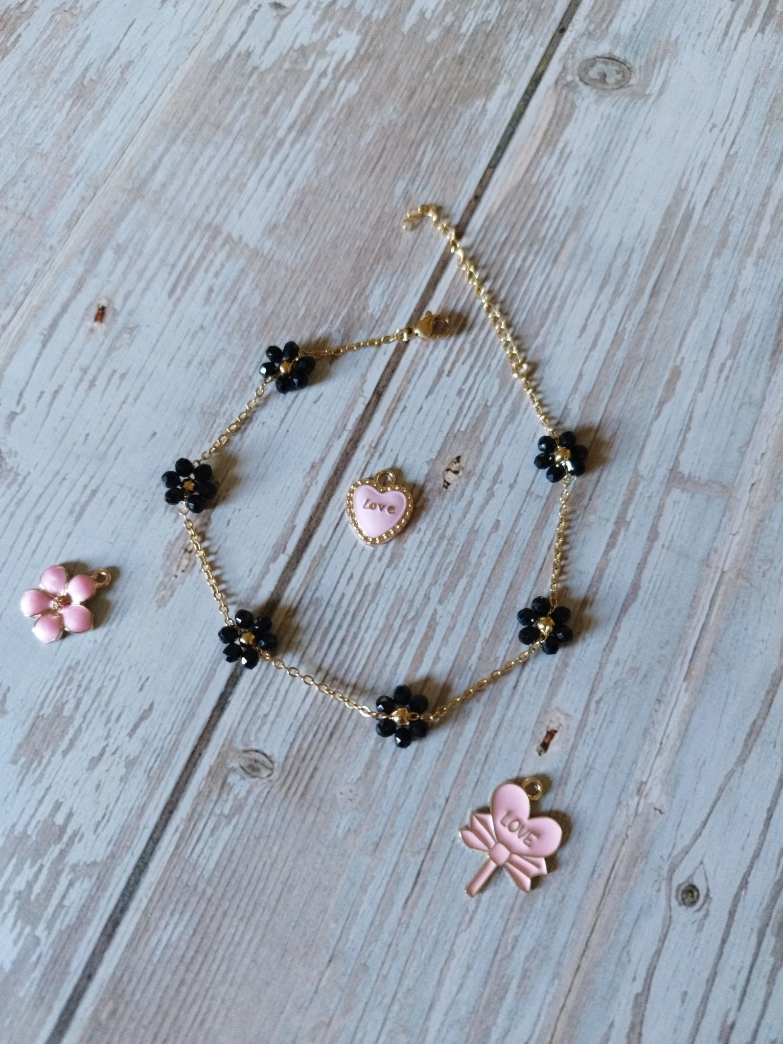 Bracelet de cheville doré fleur noires acier inoxydable 